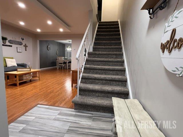 13 Heritage Ln, Fords, NJ 08863 - stairs with recessed lighting and wood finished floors