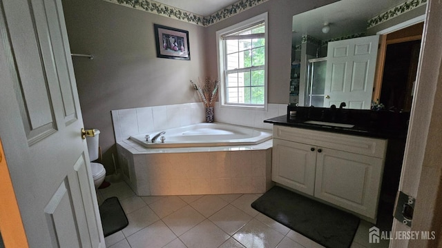 76 Tennyson Rd, East Windsor, NJ 08520 - bathroom with vanity, a bath, a stall shower, and tile patterned flooring