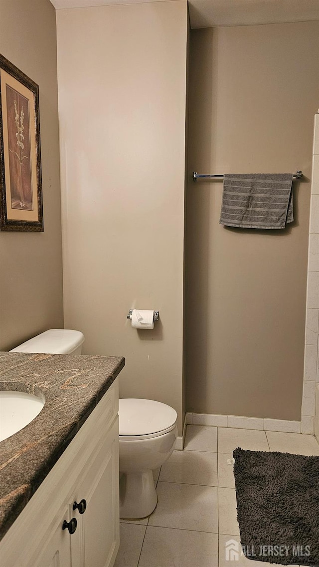 76 Tennyson Rd, East Windsor, NJ 08520 - bathroom with tile patterned floors and vanity