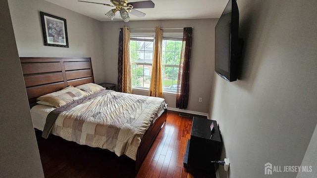 76 Tennyson Rd, East Windsor, NJ 08520 - bedroom with dark wood-style floors and a ceiling fan