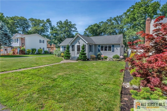 706 Wood Ave, North Brunswick, NJ 08902 - ranch-style home featuring a front lawn