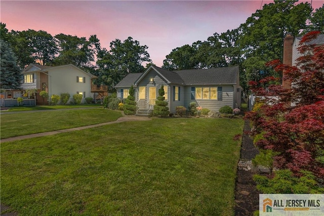 706 Wood Ave, North Brunswick, NJ 08902 - view of front of home with a yard