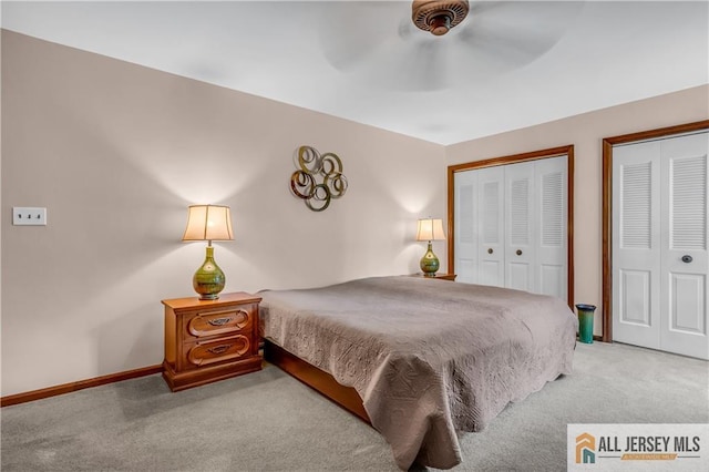 706 Wood Ave, North Brunswick, NJ 08902 - carpeted bedroom with two closets and a ceiling fan