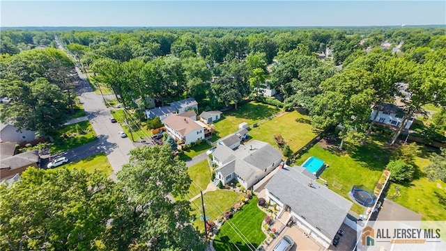 706 Wood Ave, North Brunswick, NJ 08902 - aerial view of residential area with a heavily wooded area