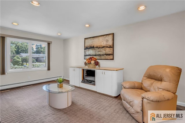 706 Wood Ave, North Brunswick, NJ 08902 - living room with a baseboard heating unit, carpet, and recessed lighting