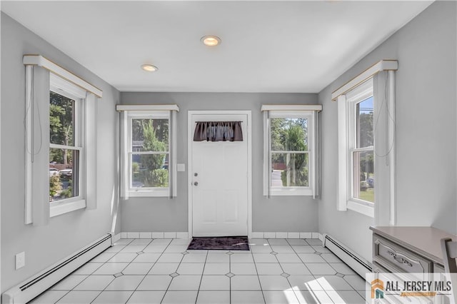706 Wood Ave, North Brunswick, NJ 08902 - entryway featuring a baseboard radiator and recessed lighting