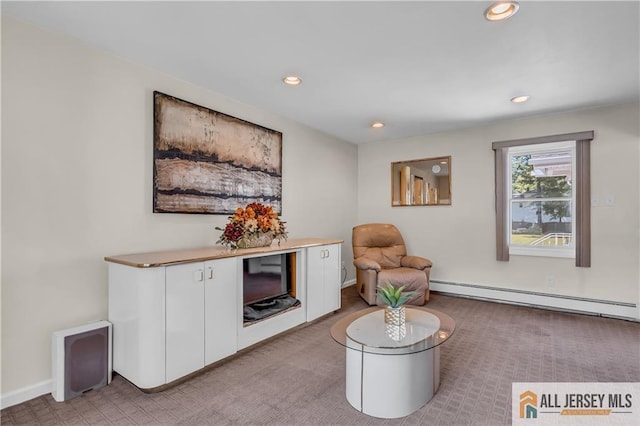 706 Wood Ave, North Brunswick, NJ 08902 - sitting room with a baseboard heating unit, light carpet, and recessed lighting