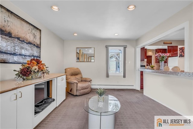 706 Wood Ave, North Brunswick, NJ 08902 - carpeted living area with a baseboard radiator and recessed lighting