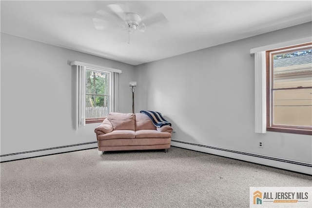 706 Wood Ave, North Brunswick, NJ 08902 - sitting room featuring baseboard heating and ceiling fan