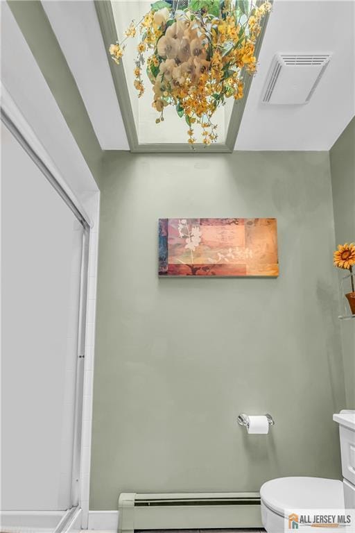 706 Wood Ave, North Brunswick, NJ 08902 - full bathroom featuring baseboard heating and a shower stall