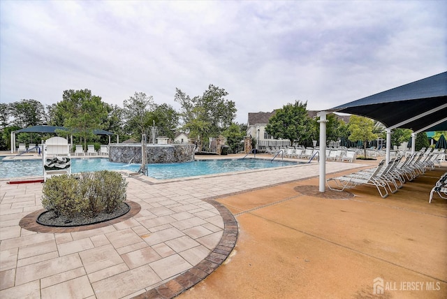 community pool featuring a patio