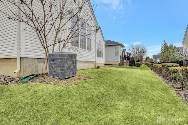view of yard featuring central AC unit