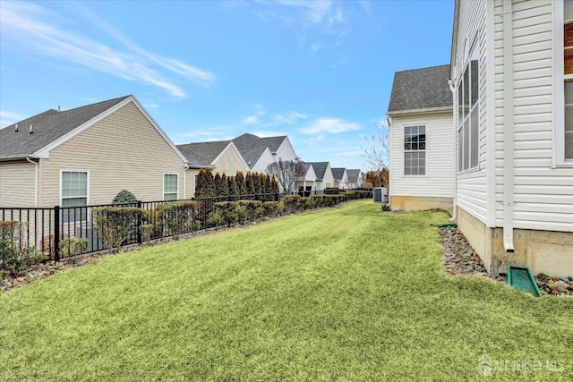 view of yard featuring central AC
