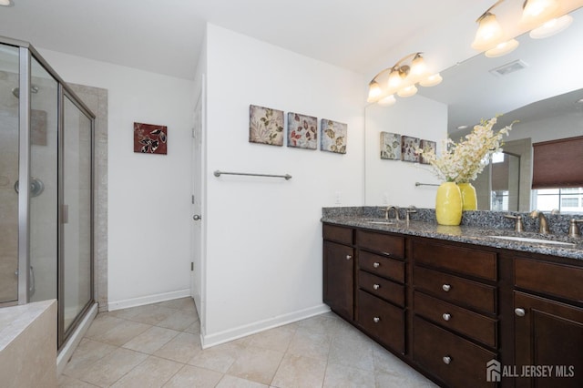 31 Morris Ln, Cranbury, NJ 08512 - full bathroom with tile patterned flooring, double vanity, a shower stall, and baseboards