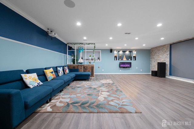 31 Morris Ln, Cranbury, NJ 08512 - living area featuring recessed lighting, wood finished floors, crown molding, a lit fireplace, and baseboards