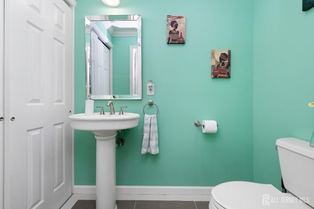 31 Morris Ln, Cranbury, NJ 08512 - bathroom with toilet, baseboards, and tile patterned floors