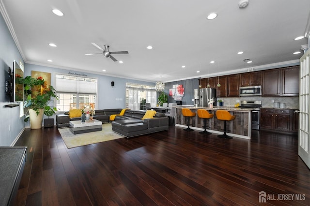 31 Morris Ln, Cranbury, NJ 08512 - living area featuring ornamental molding, ceiling fan, recessed lighting, and wood finished floors