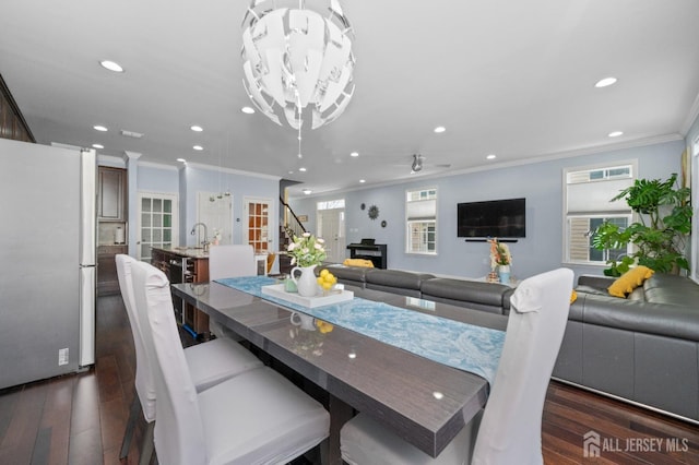 31 Morris Ln, Cranbury, NJ 08512 - dining room featuring crown molding, recessed lighting, dark wood-style floors, and plenty of natural light