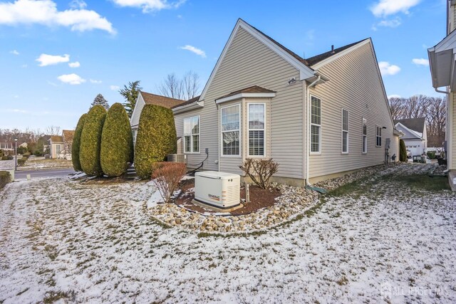 view of snow covered property