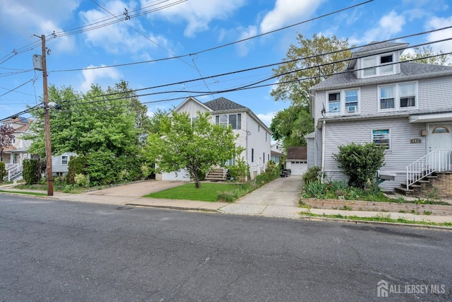104 George St, South River, NJ 08882 - view of front of home with a garage