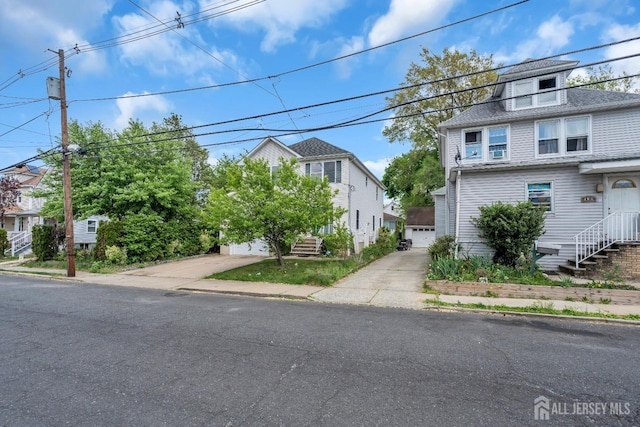 104 George St, South River, NJ 08882 - view of front of property featuring a detached garage