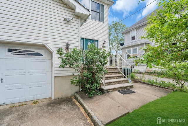 property entrance with a garage