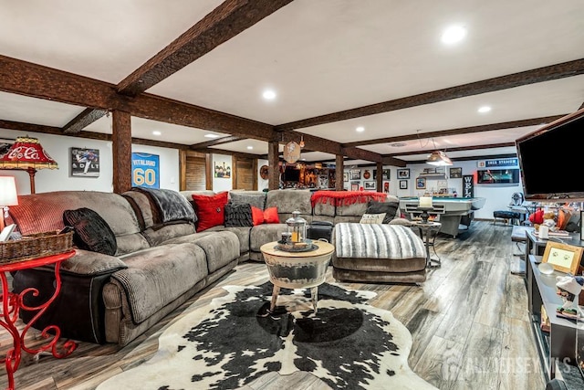 living room with beamed ceiling, recessed lighting, pool table, and wood finished floors