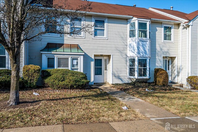 view of property with a front yard