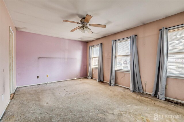 spare room featuring ceiling fan