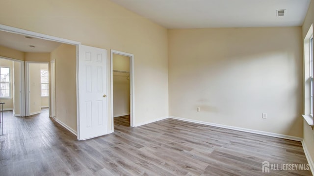 empty room with light wood-type flooring