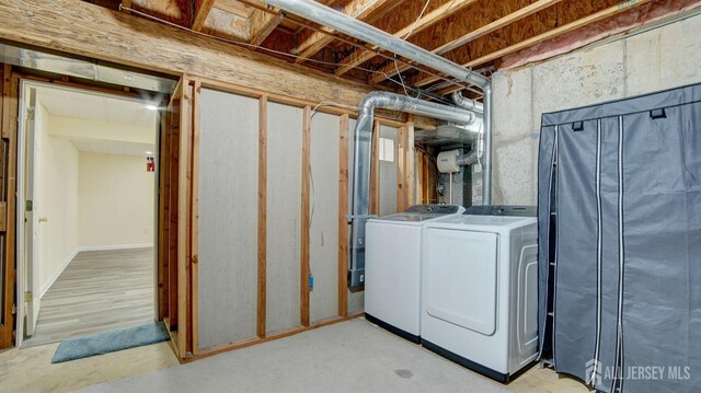 laundry room with independent washer and dryer