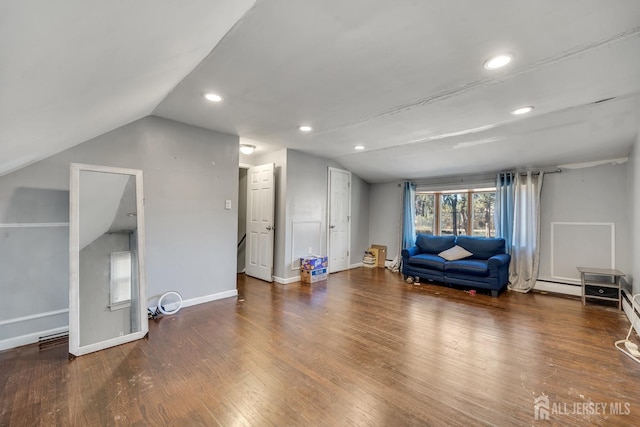 living area with lofted ceiling, recessed lighting, wood finished floors, and baseboards