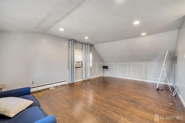 bonus room with lofted ceiling, a baseboard radiator, wood finished floors, a decorative wall, and recessed lighting