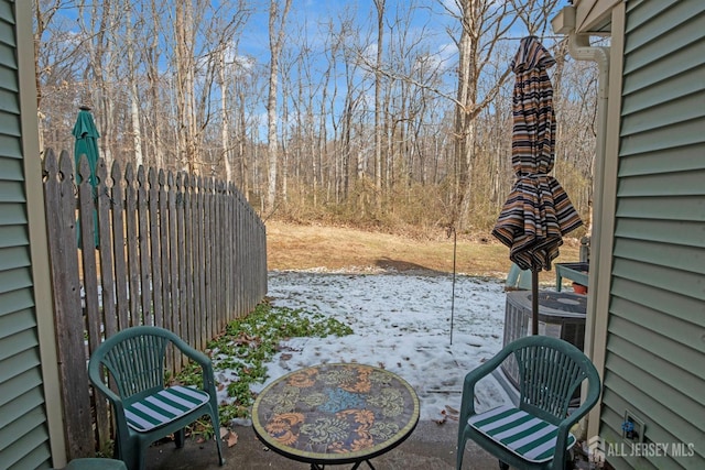 view of snow covered patio