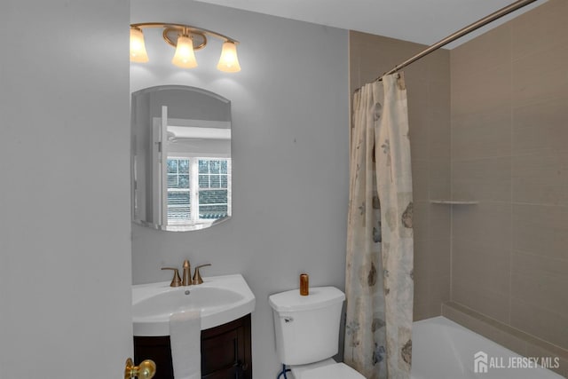 full bathroom with vanity, toilet, and shower / bath combo with shower curtain