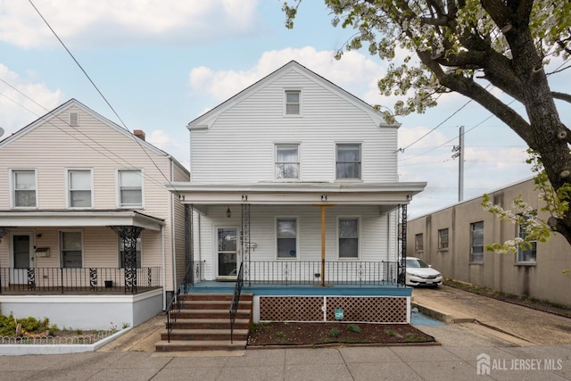 207 S Broadway, South Amboy, NJ 08879 - view of front facade featuring covered porch