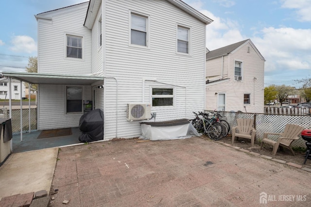 207 S Broadway, South Amboy, NJ 08879 - back of property featuring ac unit and a patio