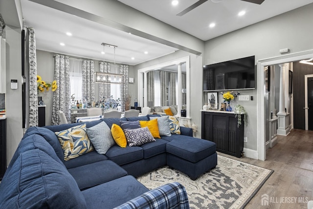 207 S Broadway, South Amboy, NJ 08879 - living area featuring ceiling fan, a chandelier, wood finished floors, recessed lighting, and plenty of natural light