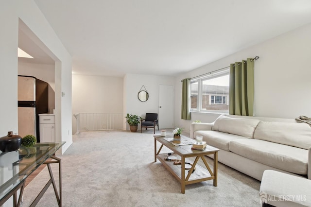 living room featuring light colored carpet