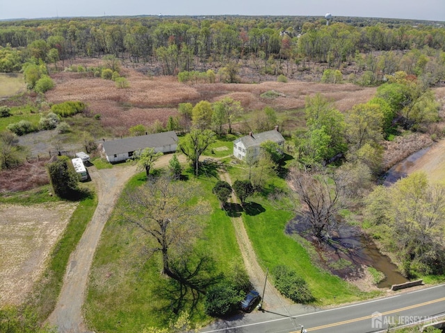 aerial overview of property's location with a forest
