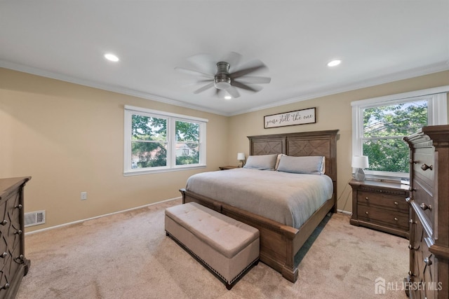 bedroom with light colored carpet, ornamental molding, recessed lighting, baseboards, and ceiling fan