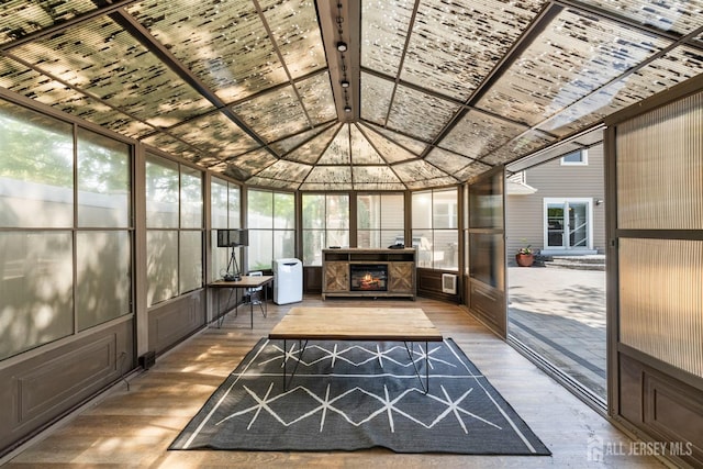 sunroom / solarium with lofted ceiling