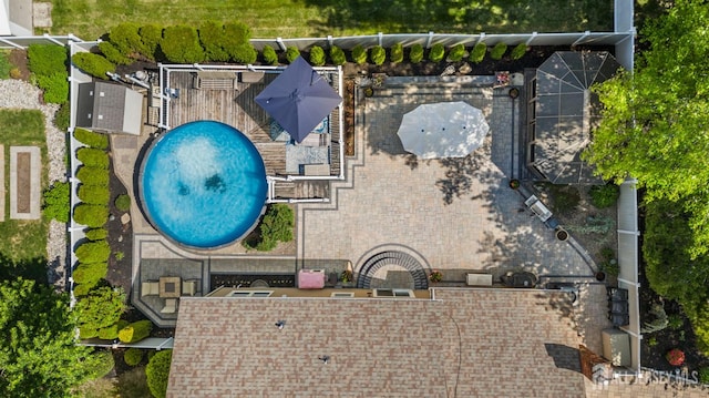 view from above of property with a pool area
