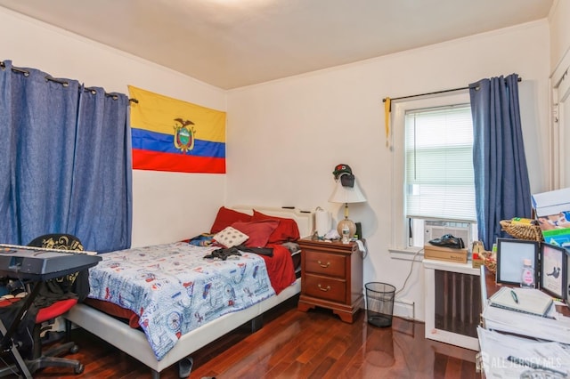 bedroom featuring dark wood-type flooring, cooling unit, and crown molding