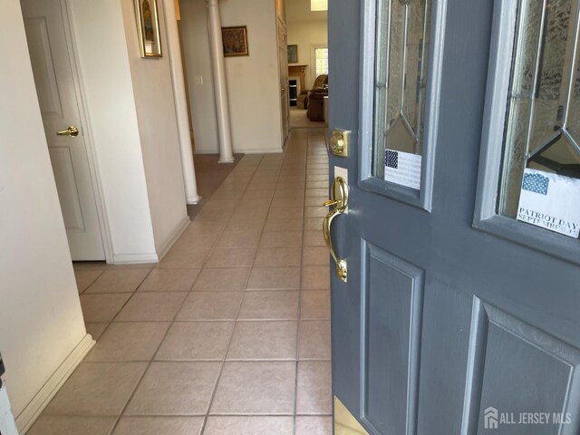 interior space featuring light tile patterned flooring