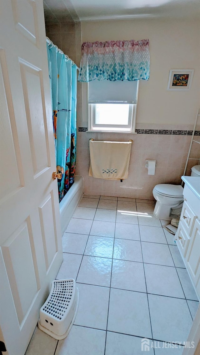 20 Ballo Pl, Edison, NJ 08820 - full bathroom with tile walls, tile patterned flooring, vanity, shower / tub combo, and wainscoting