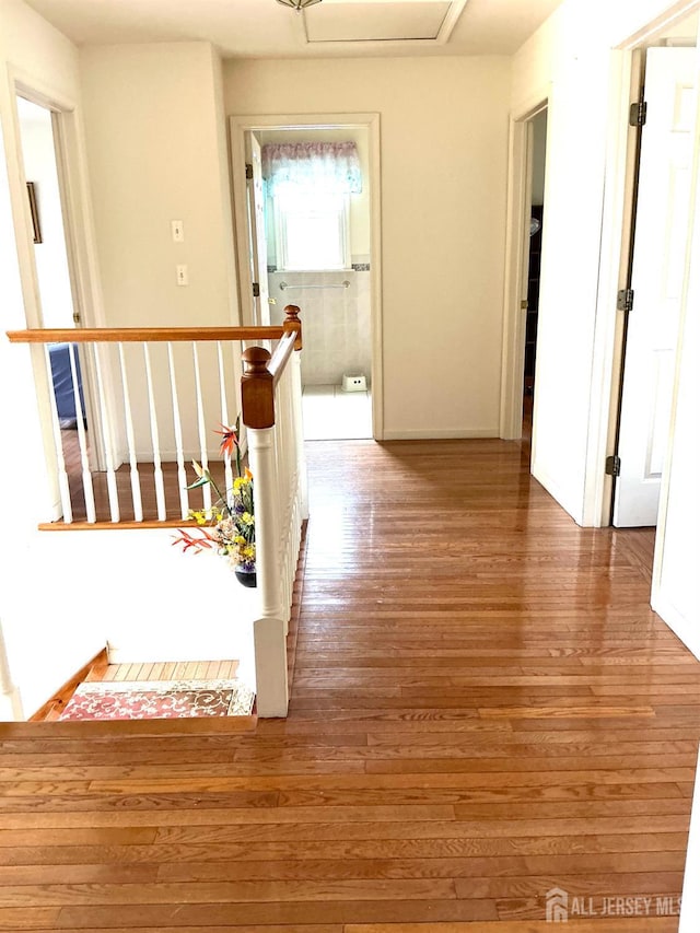 20 Ballo Pl, Edison, NJ 08820 - corridor featuring wood finished floors and an upstairs landing