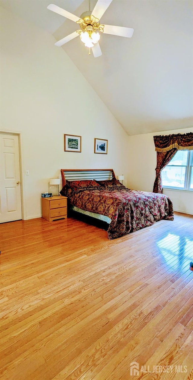 20 Ballo Pl, Edison, NJ 08820 - bedroom with light wood-style floors, high vaulted ceiling, and ceiling fan