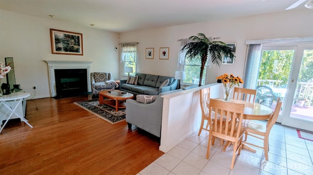 20 Ballo Pl, Edison, NJ 08820 - living room with light wood-style floors, a fireplace with flush hearth, and ceiling fan