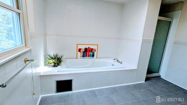 20 Ballo Pl, Edison, NJ 08820 - bathroom featuring a garden tub, a shower stall, tile patterned flooring, and tile walls